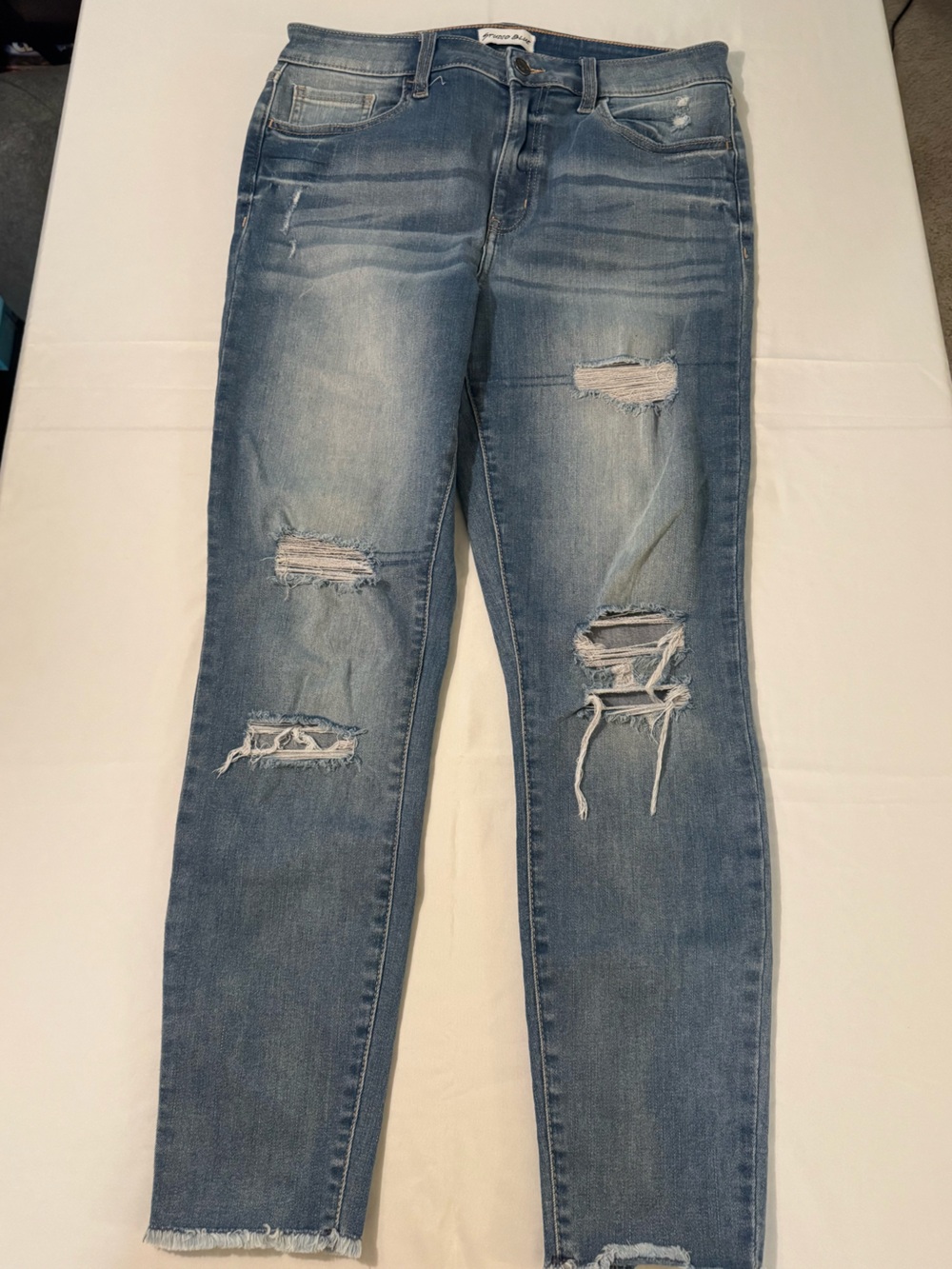 Women's Light Blue Distressed Ankle Skinny Jeans